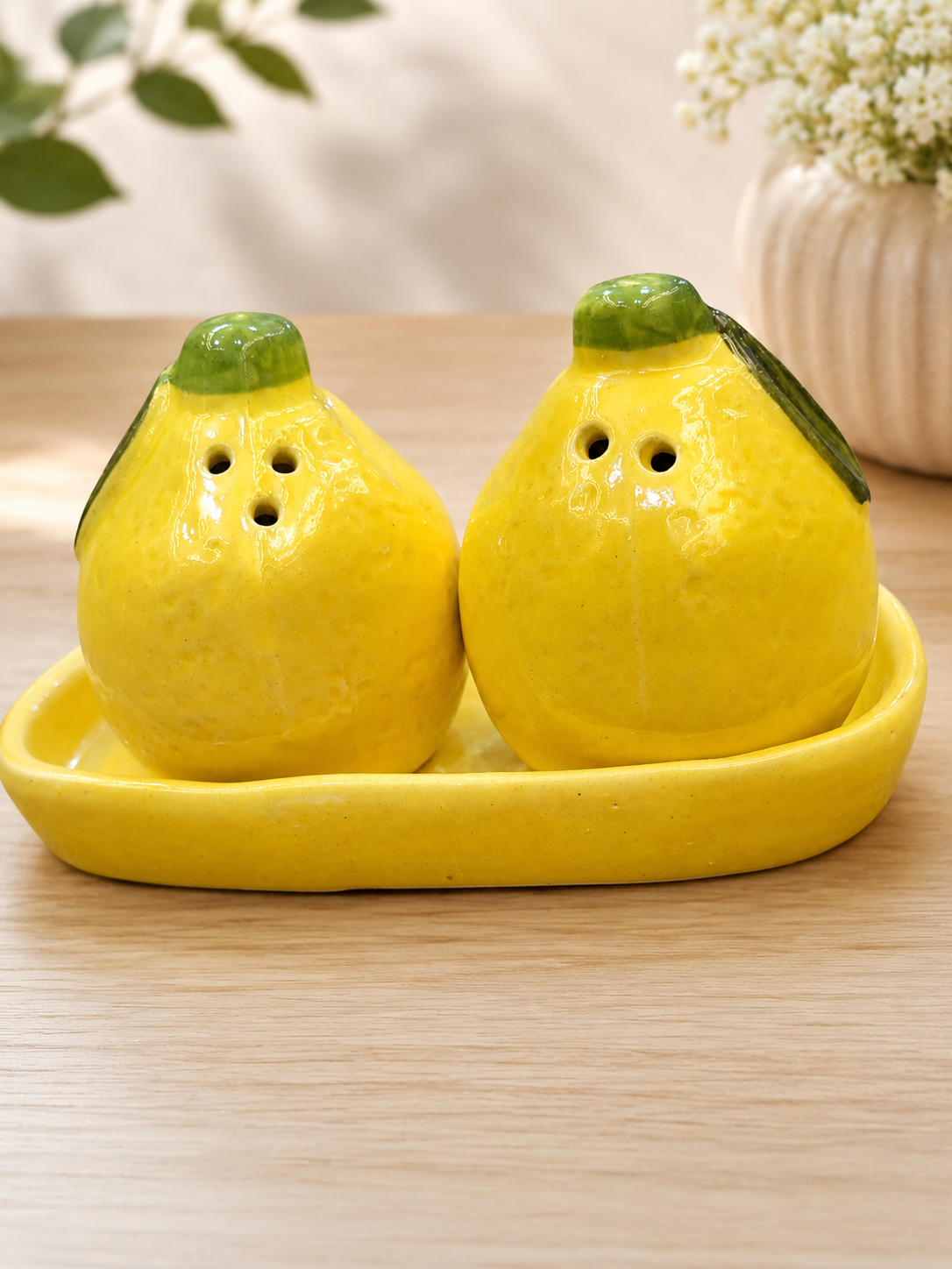 Yellow lemon shaped ceramic salt and pepper shaker set