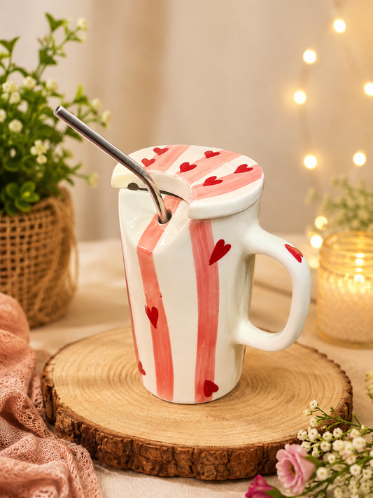 White ceramic lidded mug with pink stripes and red hearts